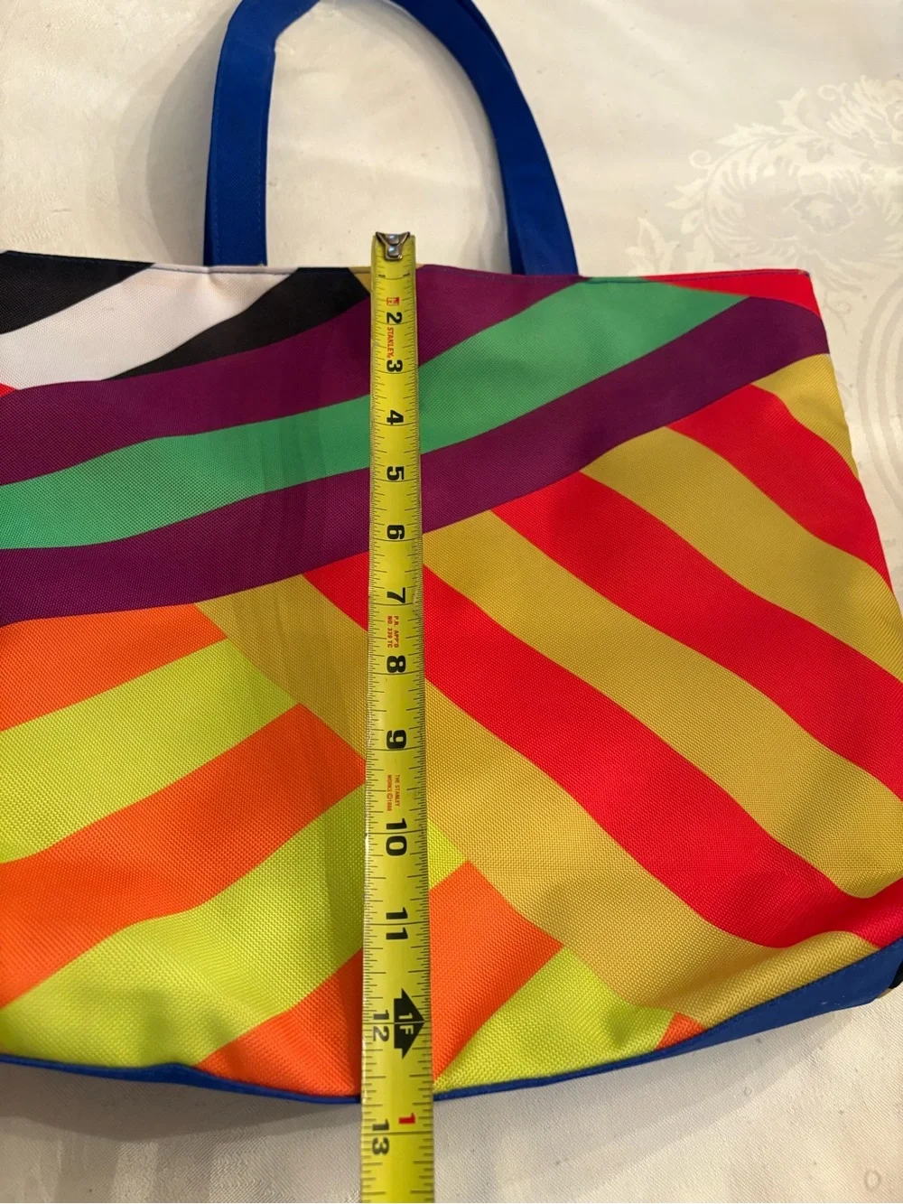 Clinique Multi-Color Diagonal Stripe Tote with Blue Handles